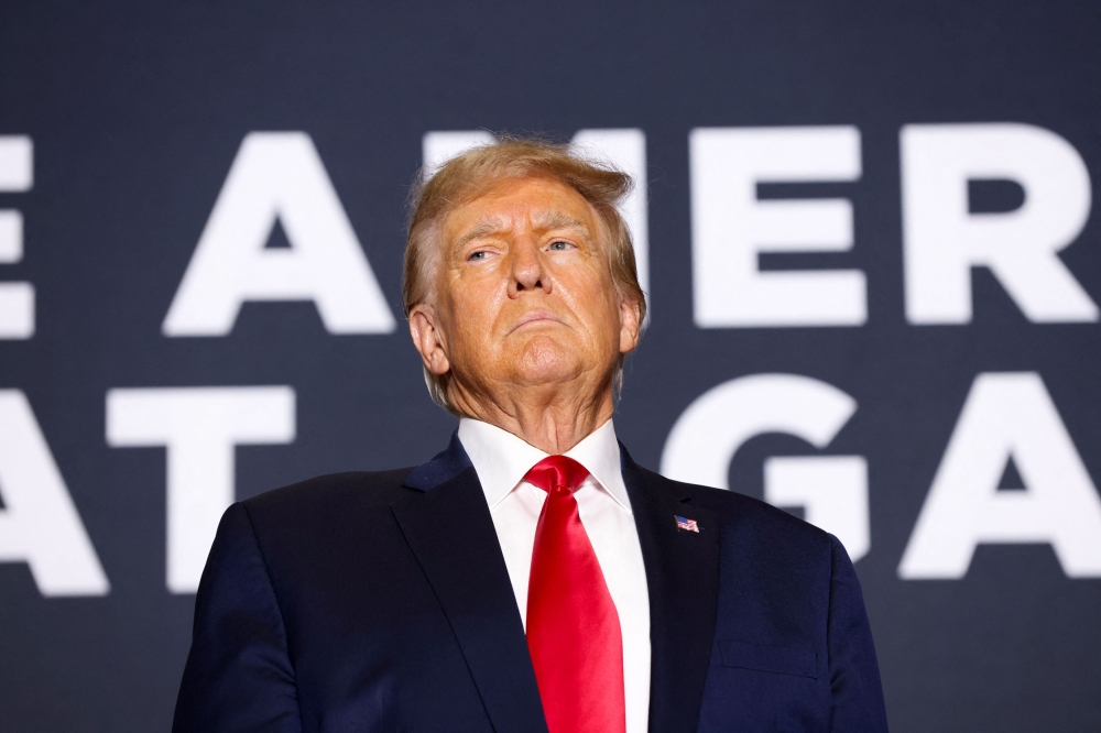 Former US President and Republican presidential candidate Donald Trump arrives on stage to speak during a 2024 presidential campaign rally in Dubuque, Iowa,  September 20, 2023. — Reuters pic