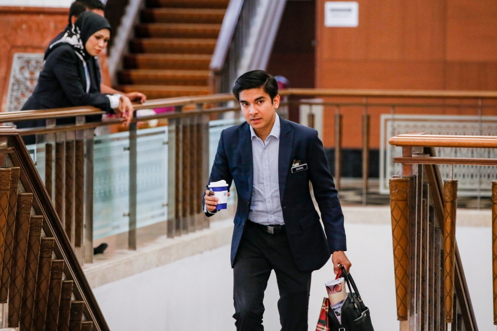 Muar MP Syed Saddiq Syed Abdul Rahman arrives at Parliament building during the debate on the 12th Malaysia Plan (12MP) mid-term review in Dewan Rakyat, September 13, 2023. — Picture by Hari Anggara