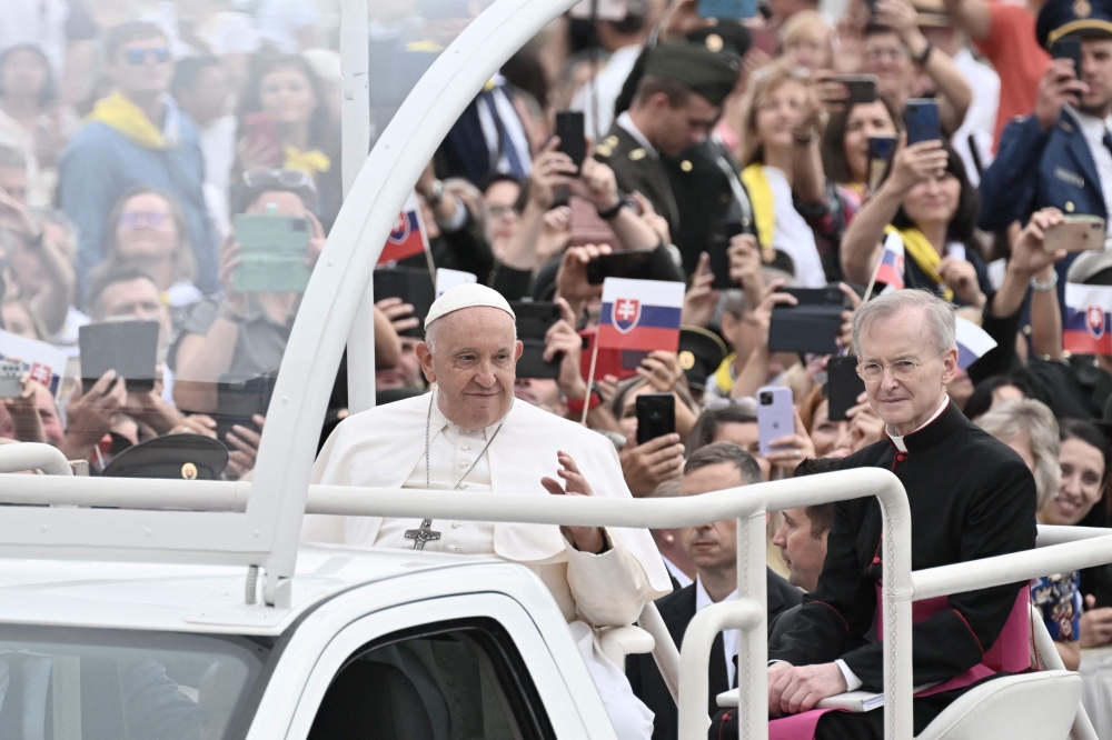 Pope Francis waves to the crowd during the weekly general audience on September 20, 2023 at St Peter's square in The Vatican. — AFP pic