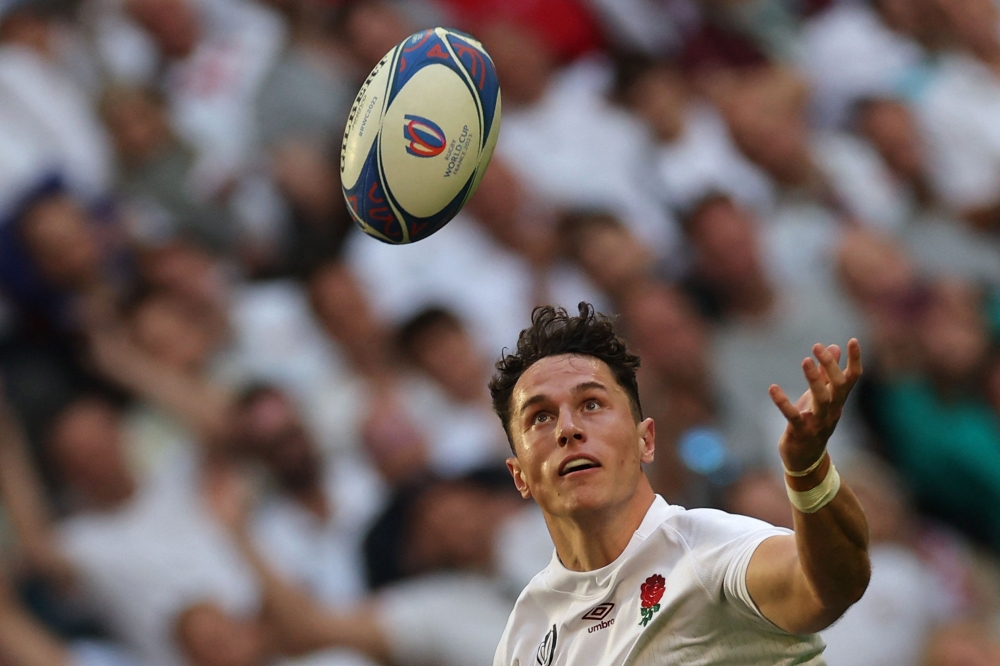England's wing Henry Arundell juggles the ball on his way to scoring a try during the France 2023 Rugby World Cup Pool D match between England and Chile at Stade Pierre-Mauroy in Lille, northern France on September 23, 2023. — AFP pic