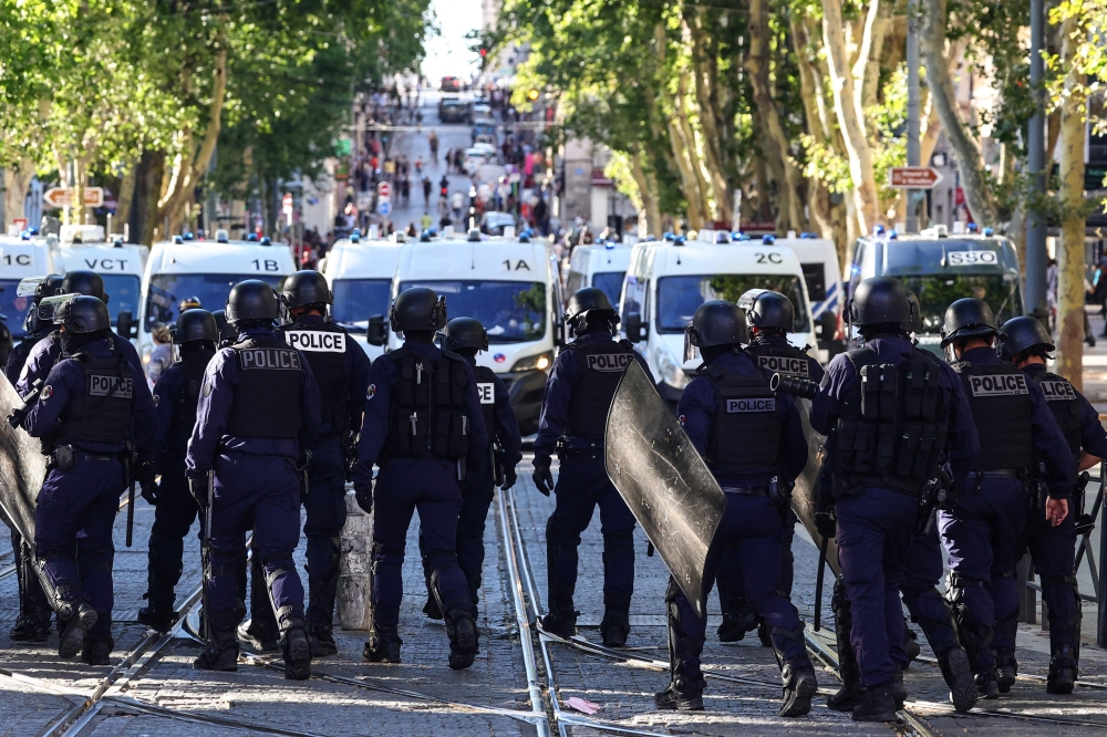 A demonstration against police in Marseille, on July 1, 2023, after a fourth consecutive night of rioting in France over the killing of a teenager by police. — AFP pic