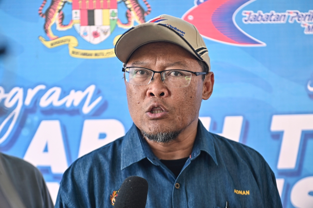 Fisheries Department director-general Datuk Adnan Hussain said the government is actively working towards expanding the milkfish farming industry nationwide. — Bernama pic