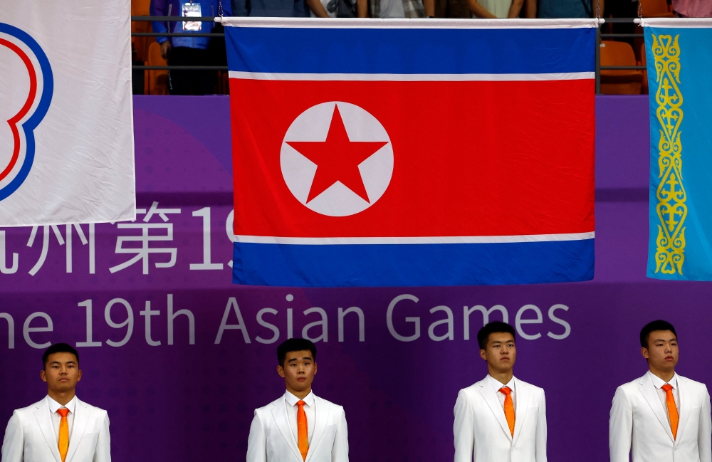 The North Korea flag is seen during the Men's 66kg medal ceremony at the Xiaoshan Linpu Gymnasium in Hangzhou September 24, 2023. — Reuters pic