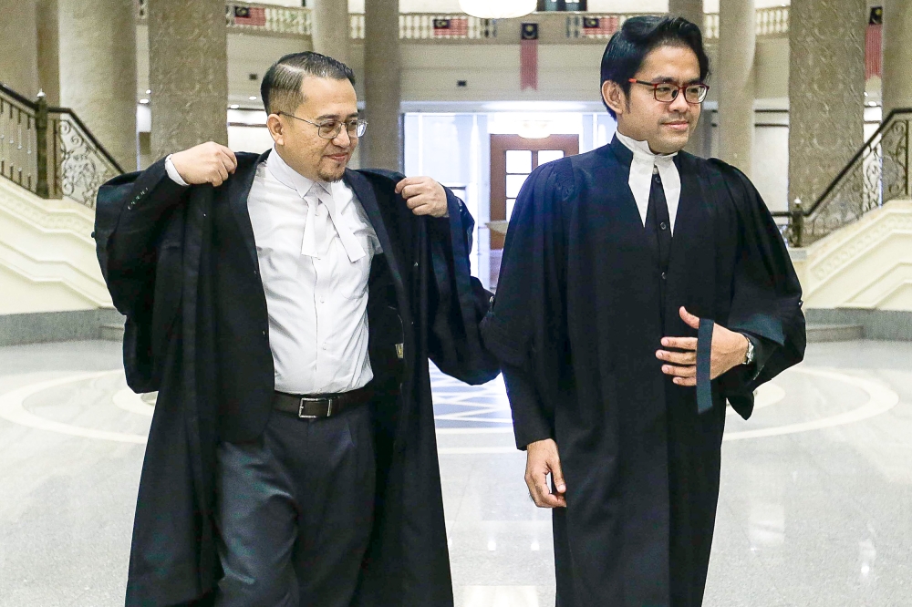 Senior federal counsel Ahmad Hanir Hambaly @ Alwi (left) and federal counsel Mohammad Sallehuddin Md Ali are seen at the Palace of Justice in Putrajaya September 25, 2023. — Picture by Sayuti Zainudin