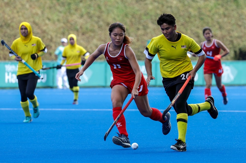 National women’s hockey player Nurmirah Syakirah Zulkifli in action against Hong Kong in the the Group A opening match at GongShu Canal Sports Park stadium in Hangzhou, September 25, 2023. — Bernama pic 
