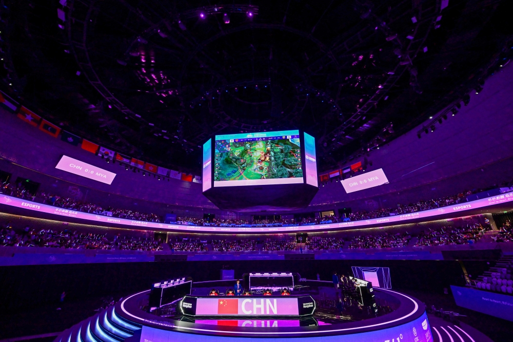 Esports players participate in the quarter-final game between Myanmar and China during the Hangzhou 2022 Asian Games in Hangzhou, in China's eastern Zhejiang province on September 24, 2023. ― AFP pic