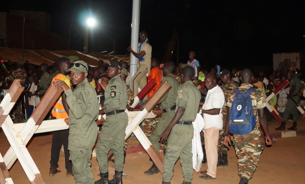 Hundreds of people gather in front of the French military base to hold a protest demanding the French soldiers to leave the country, in Niamey, Niger on September 24, 2023. — Balima Boureima/Anadolu Agency via Reuters