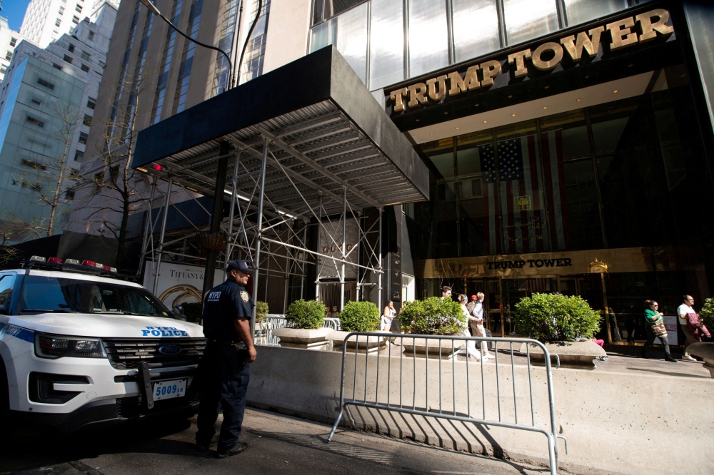 The ruling could force Trump to give up control to a receiver of properties including Manhattan’s Trump Tower, golf courses and his family estate in a Manhattan suburb. — Reuters pic