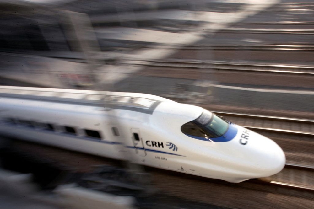 A bullet train is pictured near a railway station in Shanghai on January 28, 2007. — Reuters file pic