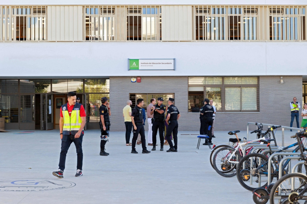 A 14-year-old stabbed three teachers and two students at a school in southern Spain yesterday, sparking soul-searching in a country where such attacks are very rare. — AFP pic