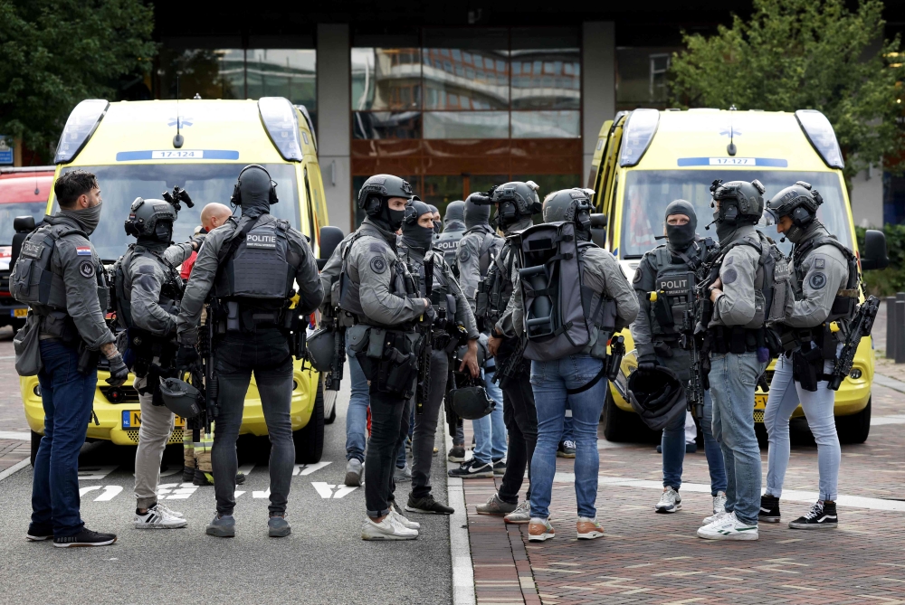 Netherlands’ special intervention police officers gather at the Erasmus University Medical Centre (Erasmus MC) in Rotterdam. — AFP pic