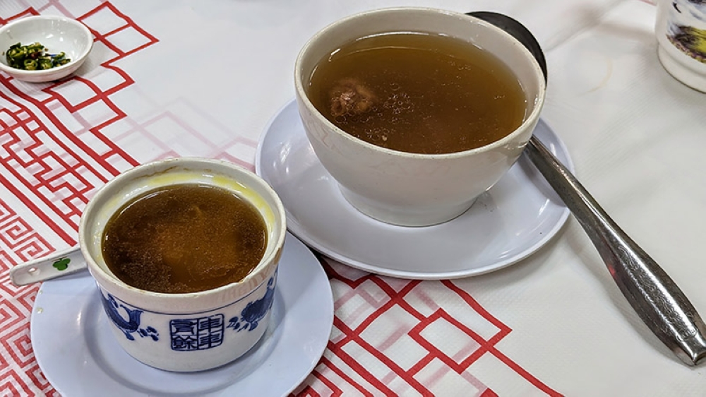 A pair of double-boiled soups at Nice Soup Gang: fish maw and maca with chicken (left) and shark bone and pork rib (right). — Pictures by Ethan Lau