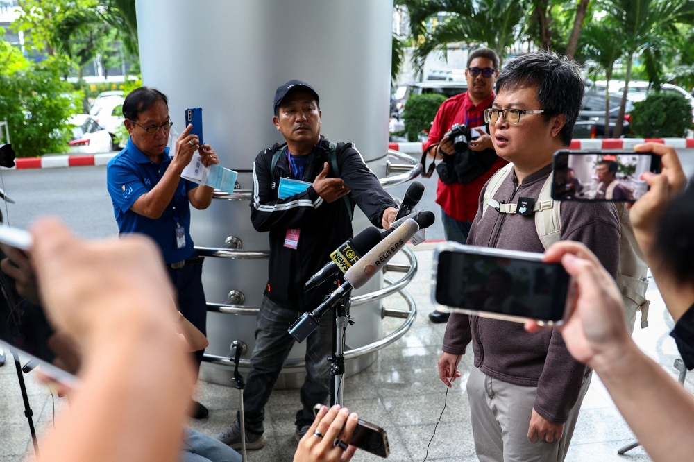 File photo of Arnon Nampa, a prominent activist and former human rights lawyer, speaking to media ahead of a Thai criminal court’s verdict in a case of allegedly having insulted the monarchy, at the criminal court in Bangkok, Thailand, September 26, 2023. — Reuters pic