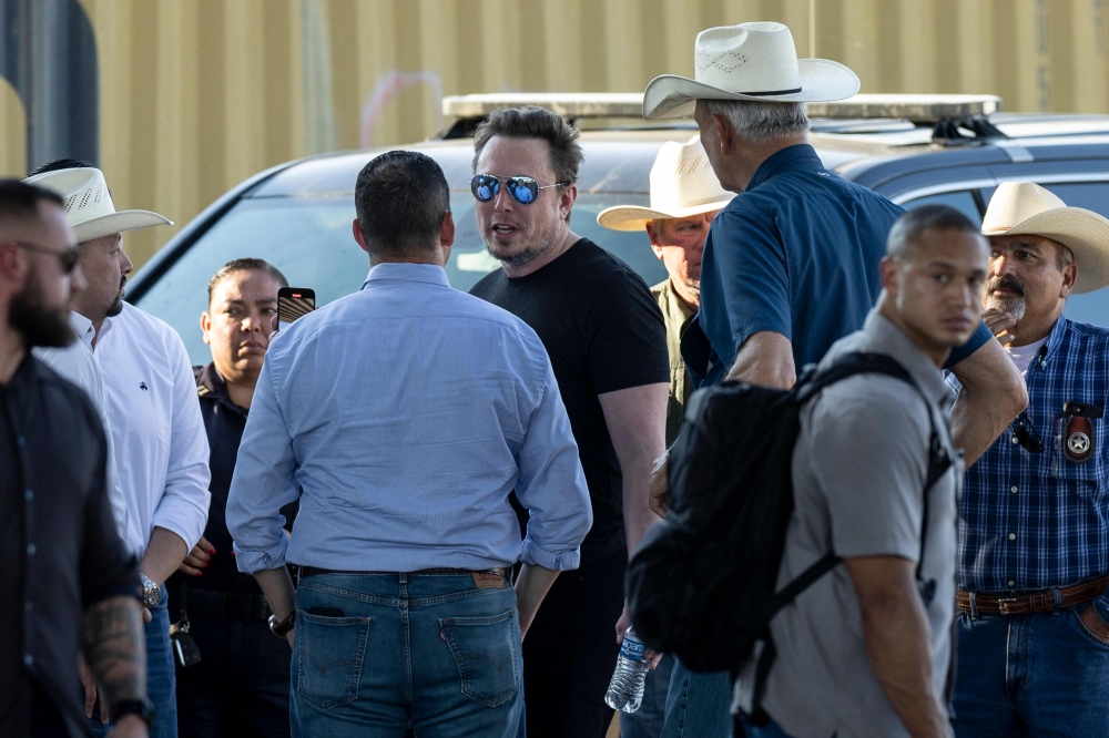 Tech entrepreneur Elon Musk with Rep. Tony Gonzales while visiting the Texas-Mexico border on September 28, 2023 in Eagle Pass, Texas. — AFP pic