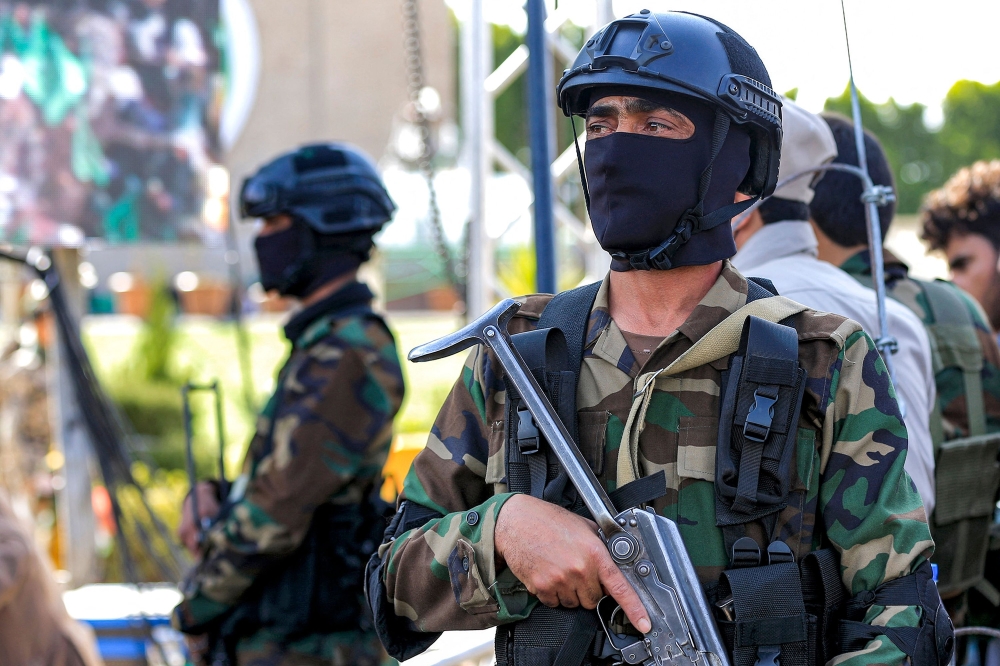 File photo of Huthi-affiliated security forces standing guard during a ceremony marking the birth anniversary of Islam's Prophet Mohammad, in Sanaa on September 27, 2023. — AFP pic