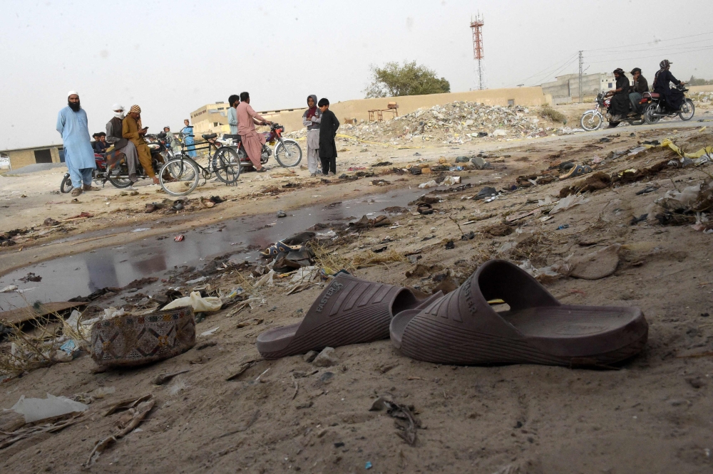 The death toll from a large blast at a mosque in Pakistan rose to 59 yesterday as the government vowed to find the perpetrators and accused India’s intelligence agency of being involved. — AFP pic