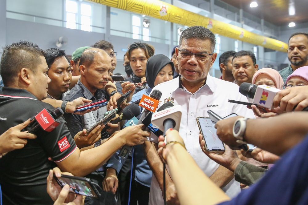Home Minister Datuk Seri Saifuddin Nasution Ismail speaks to reporters during the KDN Madani programme at Bandar Tun Razak Sport Complex in Kuala Lumpur October 1, 2023. — Picture by Yusof Mat Isa