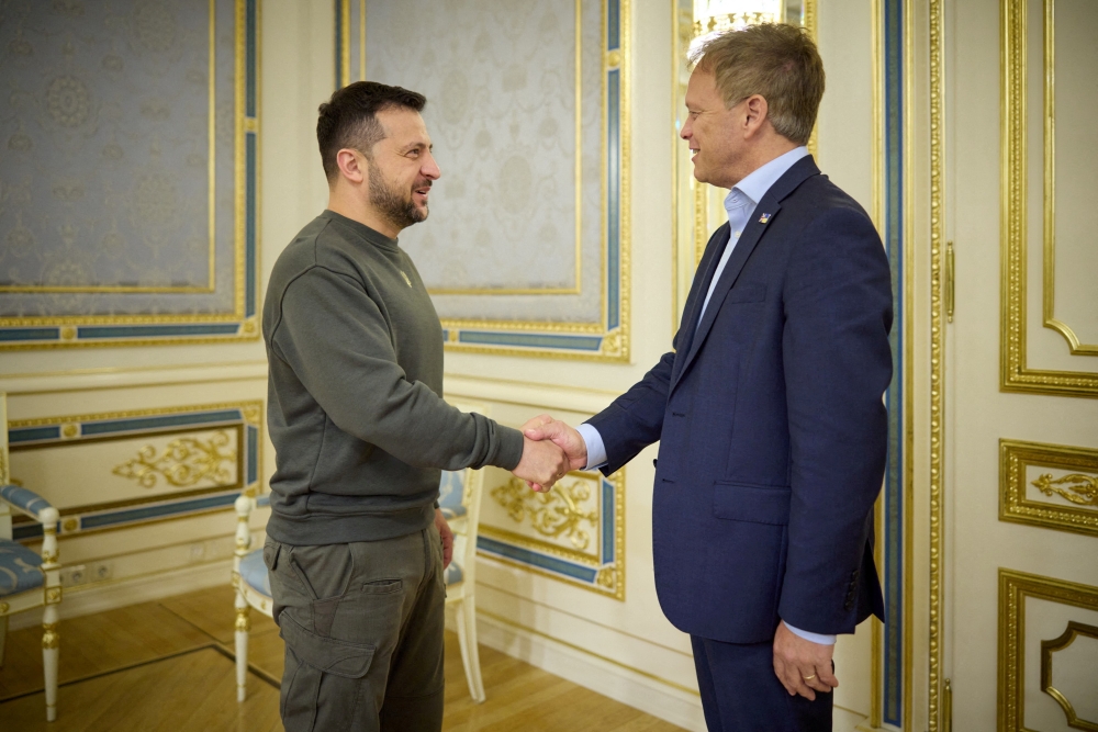 Ukraine's President Volodymyr Zelenskiy welcomes British Defence Secretary Grant Shapps before a meeting, amid Russia's attack on Ukraine, in Kyiv, Ukraine, in this handout picture released September 28, 2023. — Ukrainian Presidential Press Service handout via Reuters
