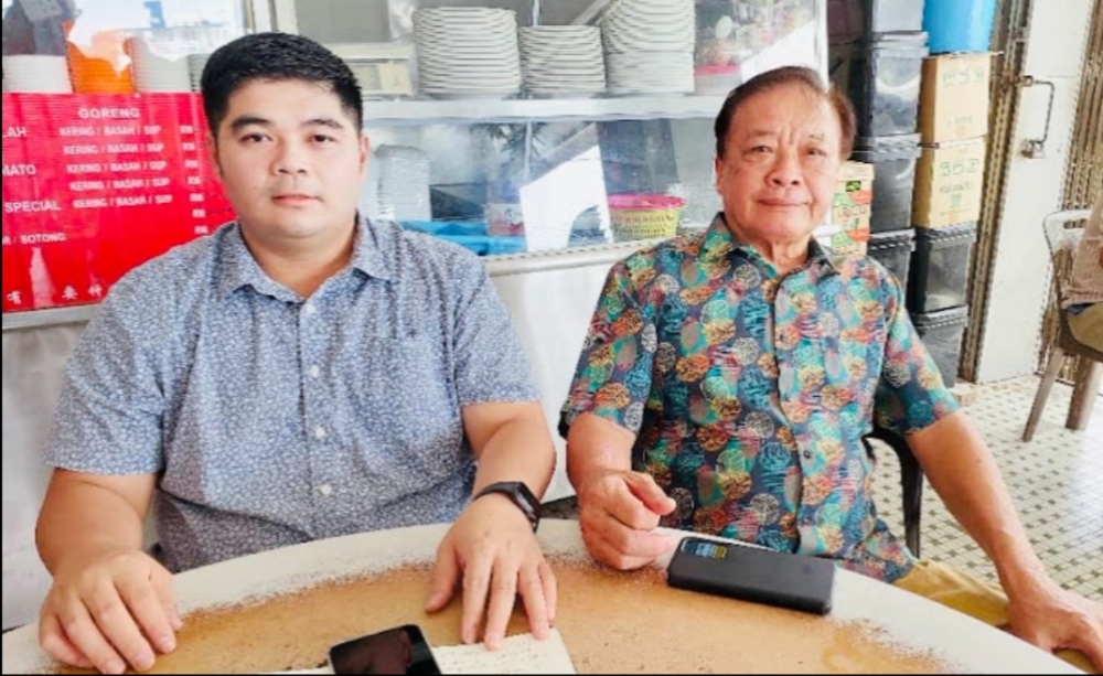 DAP's Chiew Chan Yew (left) and Bintulu Post user  Joseph Ling speak to the media on Bintulu Port’s issues. — Borneo Post Online