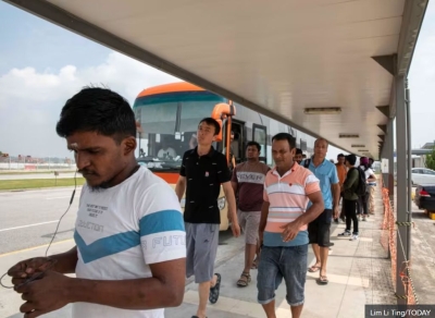Singapore: Migrant workers at Tanah Merah dorm have to wait hours for shuttle bus; operator says it's only a peak-period problem - Vimarsana News