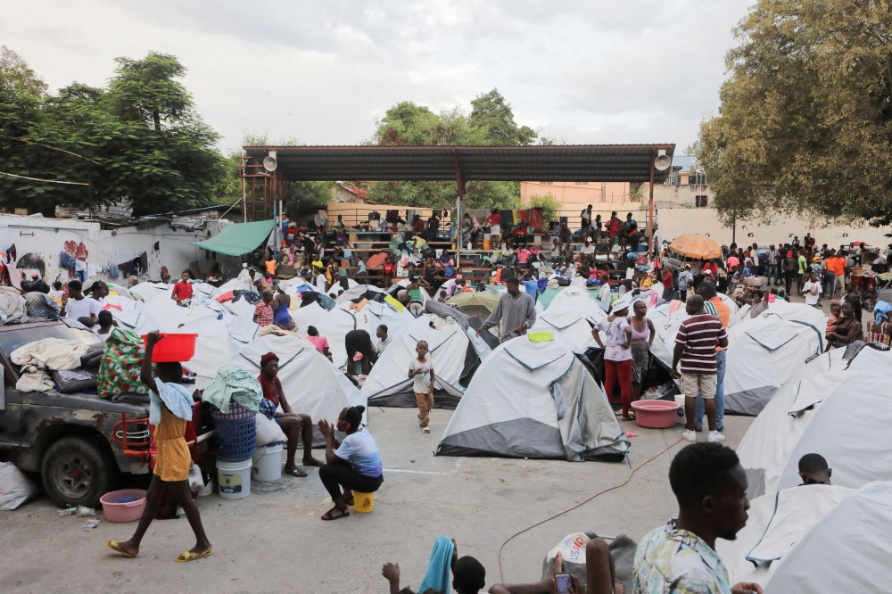 People fleeing gang violence take shelter at a sports arena, in Port-au-Prince, Haiti. — Reuters pic 
