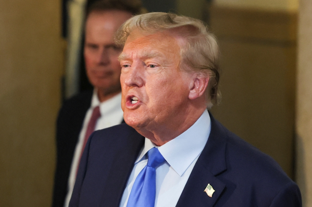 A defiant Donald Trump attacked New York’s attorney general and the judge overseeing his civil fraud trial as it began yesterday, with a state lawyer accusing the former president of generating more than US$100 million by lying about his real estate empire. — Reuters pic