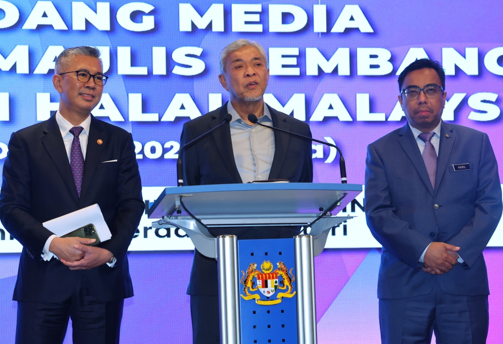 Deputy Prime Minister Datuk Seri Ahmad Zahid Hamidi speaks at a press conference after chairing the Malaysia Halal Industry Development Council meeting in Putrajaya, October 3, 2023. — Bernama pic   