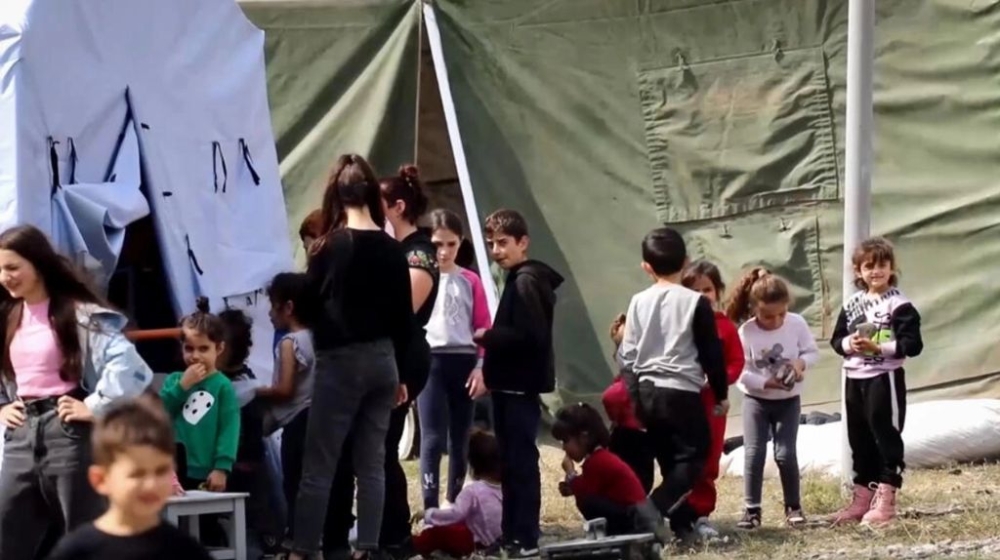 Footage released by the Russian defence ministry shows Armenian civilians at a makeshift camp at a Russian military base near Stepanakert. — Handout Russian Defence Ministry/AFP pic