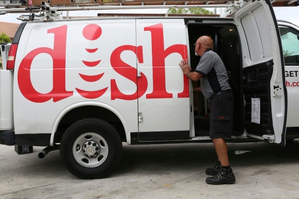 US satellite television network Dish has been slapped with the first-ever fine by US authorities over space debris. — AFP pic