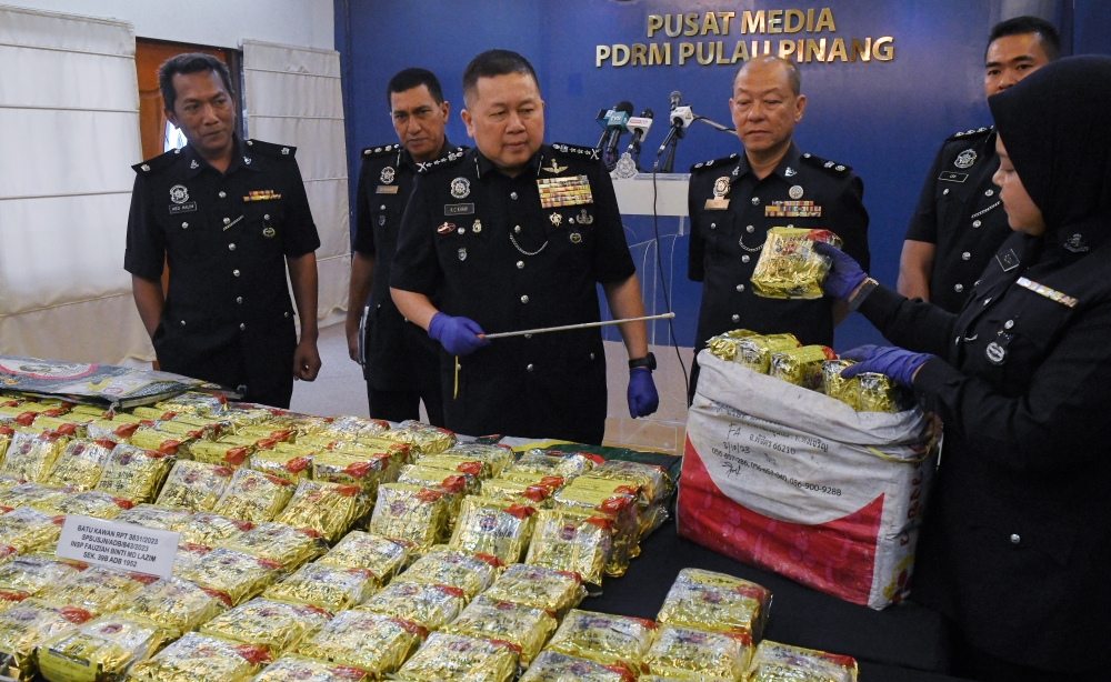 Penang police chief Datuk Khaw Kok Chin with the seized drugs at the Penang contingent police headquarters, George Town, October 4, 2023. — Bernama pic     