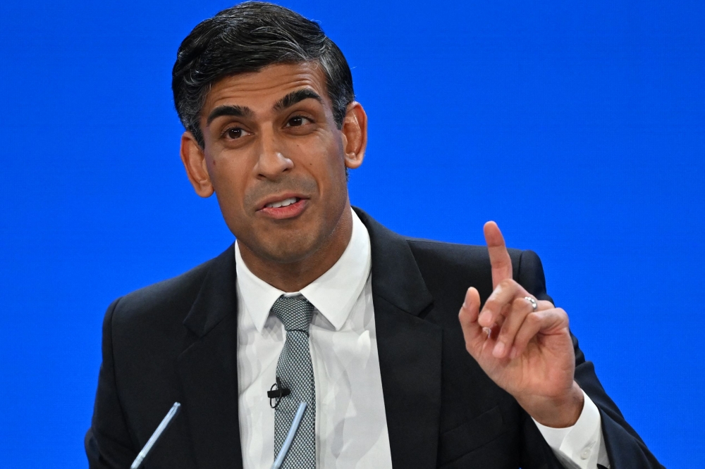 British Prime Minister Rishi Sunak yesterday vowed to introduce legislation to reduce tobacco use saying there was no safe level of smoking. —  AFP pic