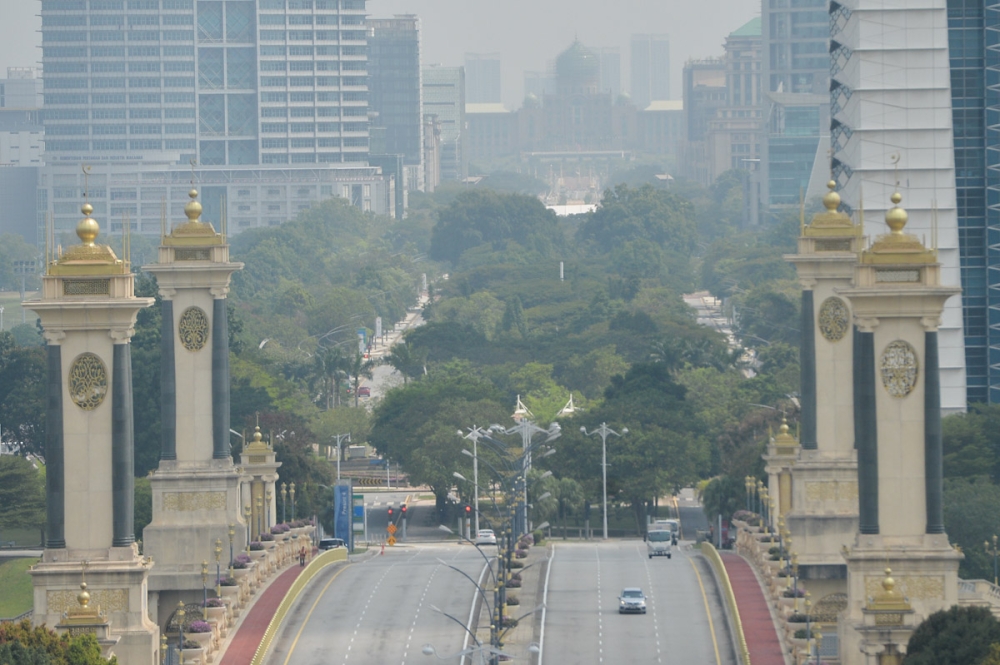 A general view shows the Prime Minister's Office (PMO) in Putrajaya shrouded in haze,  October 3, 2023. — Picture by Miera Zulyana