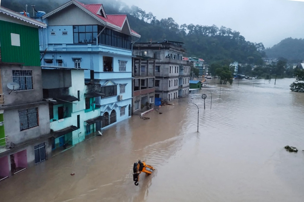 This handout photograph released by the Indian Army and taken on October 4, 2023, shows a flooded street in Lachen Valley, in India’s Sikkim state following a flash flood caused by intense rainfall. — AFP pic/Indian Army