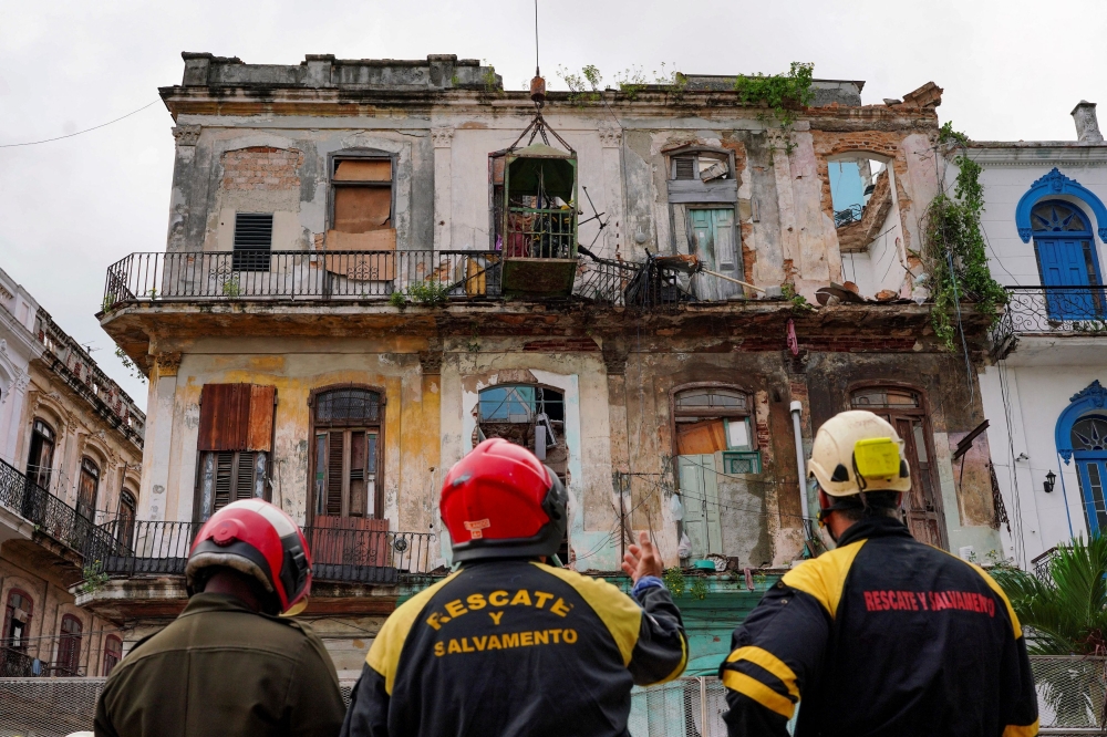 A residential building collapse in the Cuban capital of Havana on Tuesday night has killed at least three people, state media said yesterday. — Reuters pic
