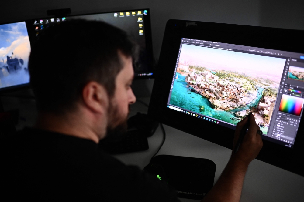 A graphic designer puts the final touches to a scene of Ubisoft's forthcoming video game 