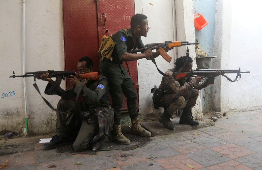 Somali security forces hold their positions near the mayor's office following a blast in Mogadishu January 22, 2023. — Reuters pic