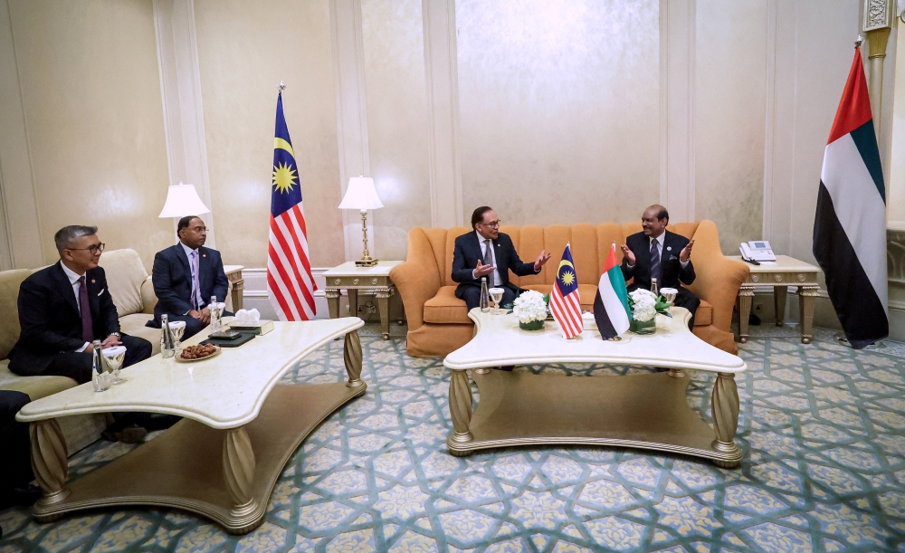 Prime Minister Datuk Seri Anwar Ibrahim meeting with Chairman and Managing Director of Lulu Group International, MA Yusuff Ali, during his working visit to the United Arab Emirates. Seen also are Investment, Trade and Industry Minister Tengku Datuk Seri Zafrul Tengku Abdul Aziz and Foreign Minister Datuk Seri Zambry Abdul Kadir. — Bernama pic
