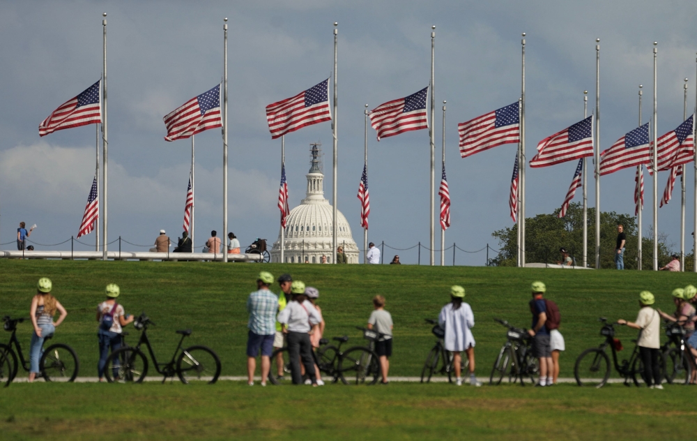 A bicycle tour stops on the National Mall with the U.S. Capitol in the distance, where House Republicans are searching for a new Speaker of the House following the ouster of Kevin McCarthy, in Washington October 5, 2023. — Reuters pic