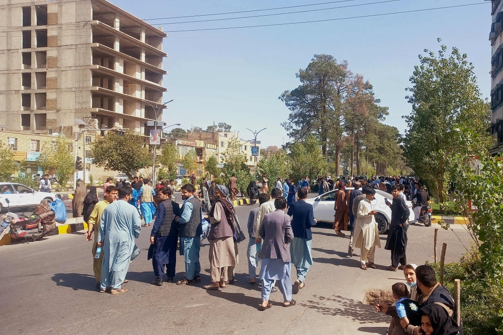 People gather on the streets in Herat on October 7, 2023. A magnitude 6.3 earthquake hit western Afghanistan October 7 morning, the United States Geological Survey said, followed by four large aftershocks with epicentres close to the region’s largest city. — Reuters pic