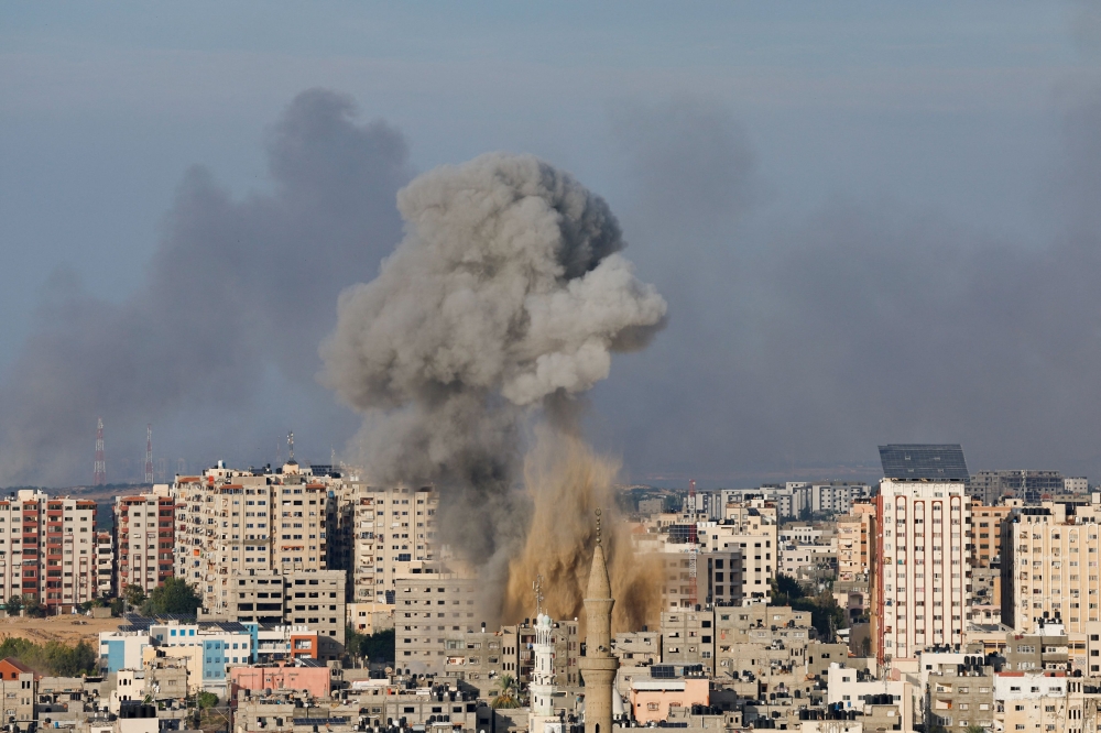 Smoke rises following Israeli strikes in Gaza, October 7, 2023. — Reuters pic