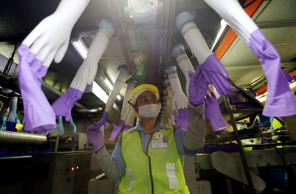 A simplified gas supply agreement, natural gas supply at reduced cost and the removal of a 0.2 per cent export cess — these items are high on the Malaysian rubber glove industry’s wish list for the upcoming Budget 2024. — Picture by Zuraneeza Zulkifli