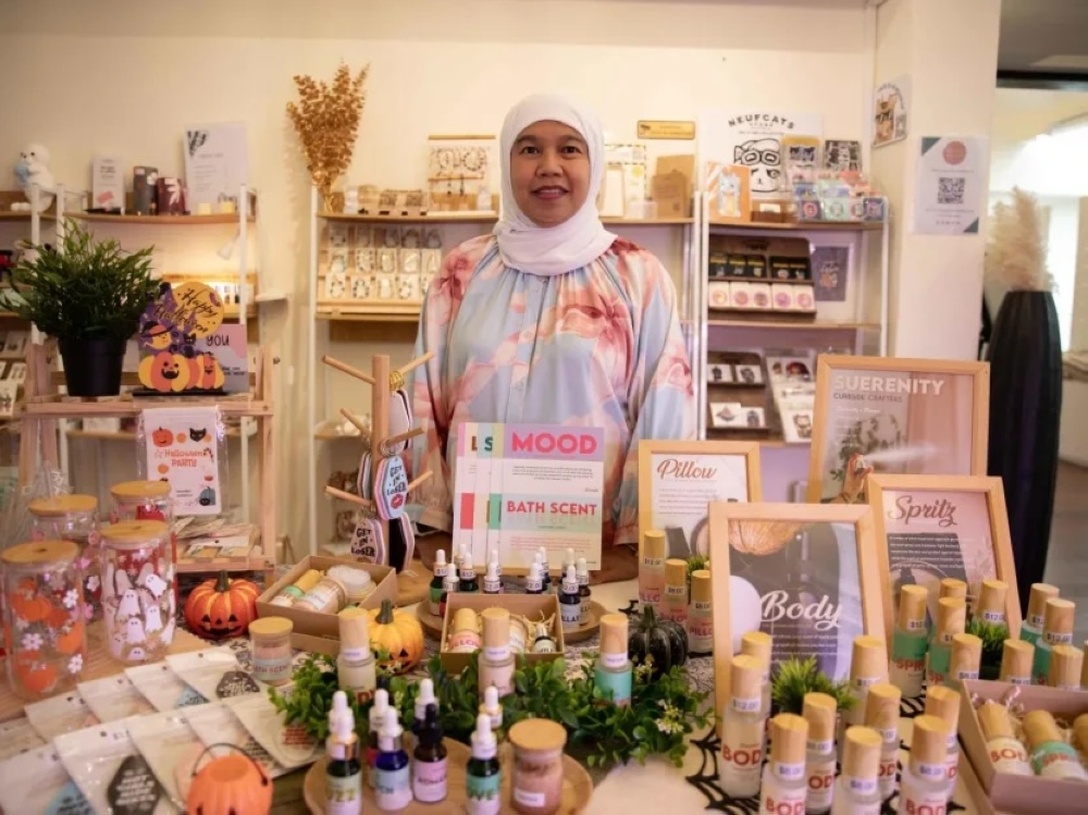 Suliah Jamal who runs Suerinity at Curbside Crafters on Oct 6, 2023. — TODAY pic