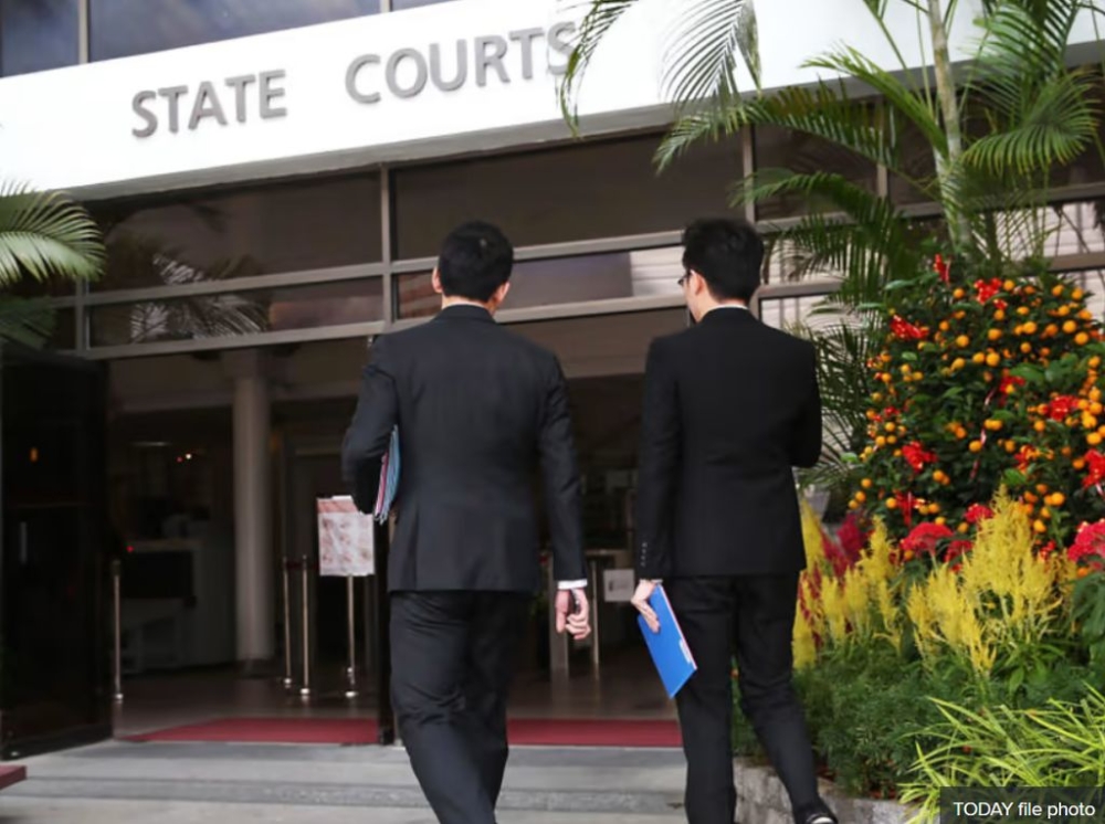 Lawyers entering the State Courts in Singapore. — TODAY file pic