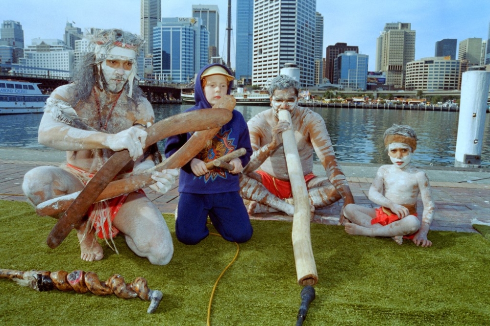 Yidaki Didge and Aboriginal dance group perform with 7 years old Amelia Street in Sydney on July 3, 1996 as part of Bandemonium, Darling Harbour's Winter Music Festival. The October 14, 2023 referendum voting opened across a swathe of Australia on a reform that would recognise Indigenous people in the 1901 constitution for the first time. — AFP pic