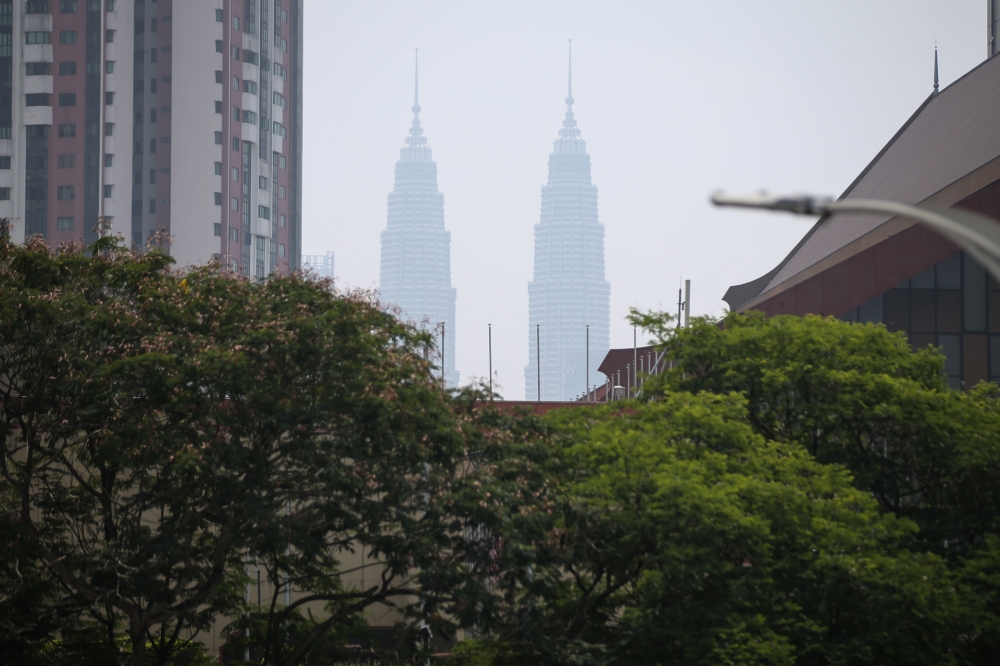 Kuala Lumpur city is shrouded in haze, October 8, 2023. — Picture by Ahmad Zamzahuri