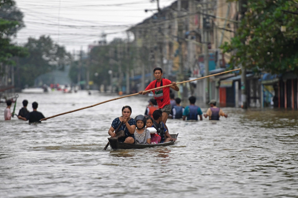Record rain sparks floods in Myanmar, displaces 14,000 | Malay Mail