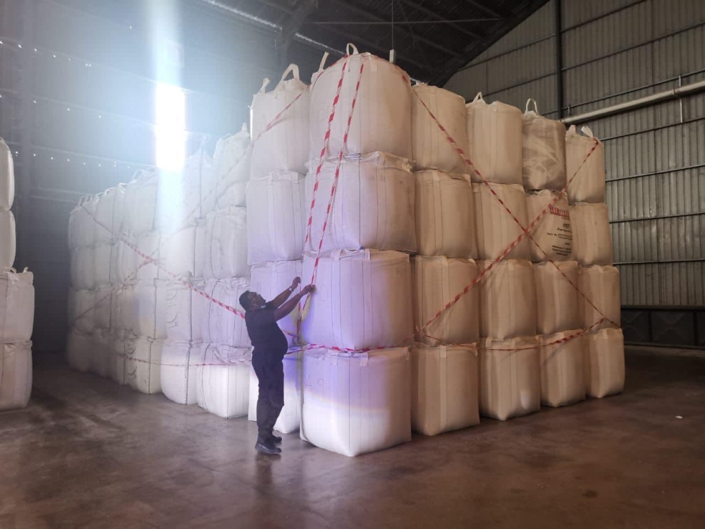 Authorities have confiscated 180 metric tonnes of local white rice hidden in a rice mill in Kedah. — Picture courtesy of Kementerian Pertanian dan Keterjaminan Makanan