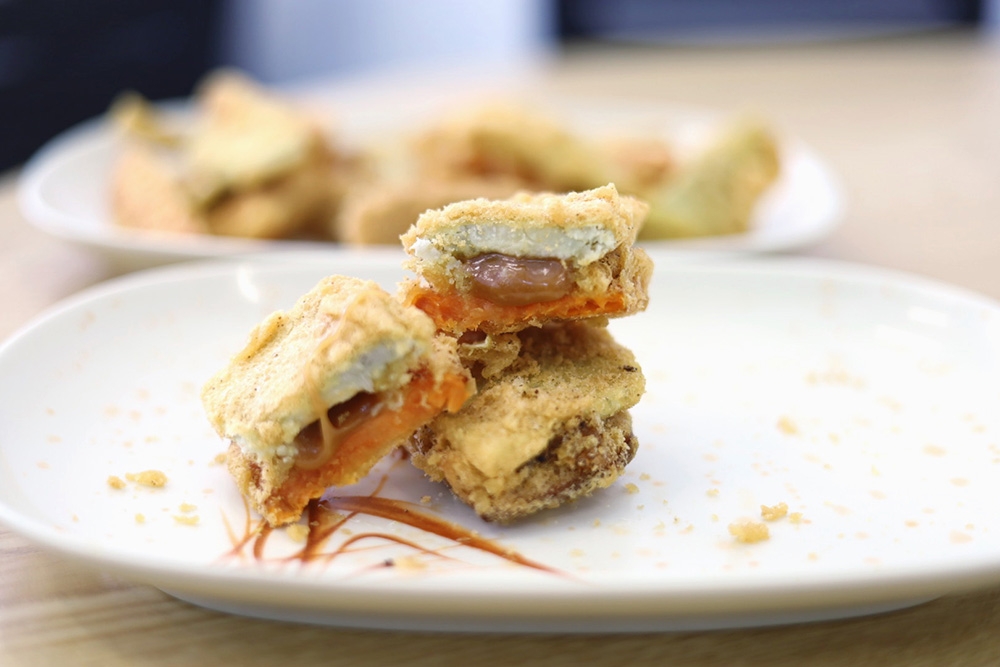 The 3 in 1 T-Kuih is an addictive bite with the fluffy yam and sweet potato combined with the soft, elastic 'nien koh'.