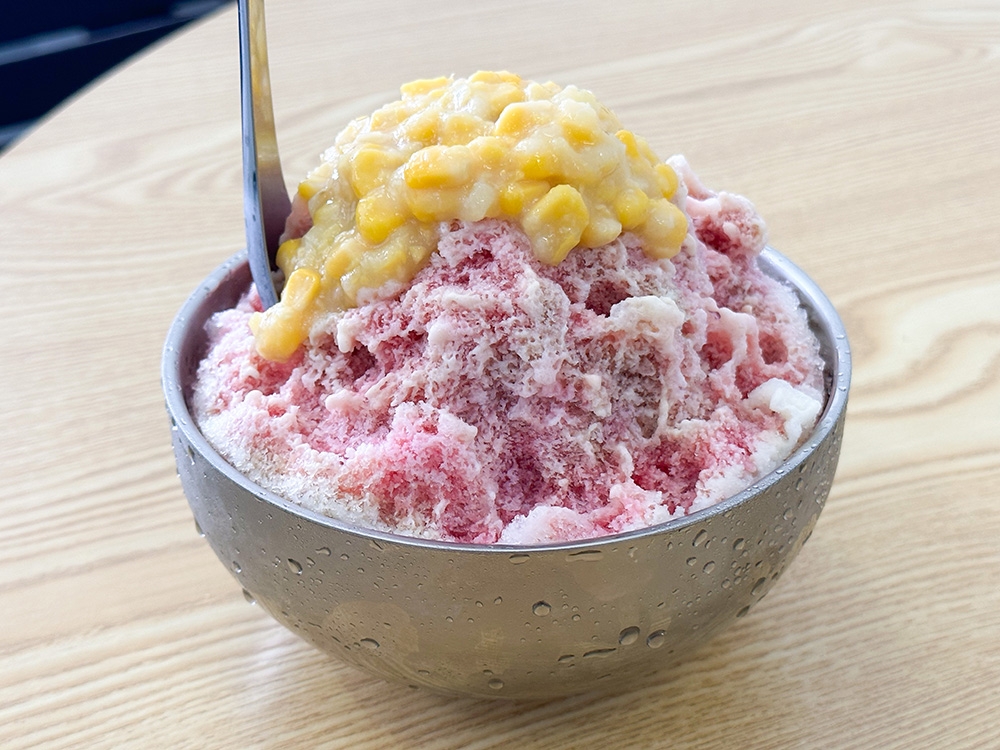 Pair those fritters with a bowl of Penang Style Ice Kacang that boasts fluffy, fine shaved ice doused with rose-sarsaparilla syrup and candied nutmeg.