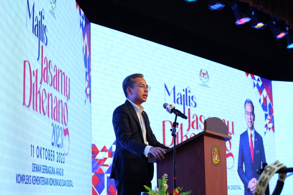 Minister of Communications and Digital Fahmi Fadzil speaks during the Majlis Jasamu Dikenang programme in Putrajaya October 11, 2023. ― Bernama pic